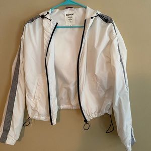 White zip up wind breaker
